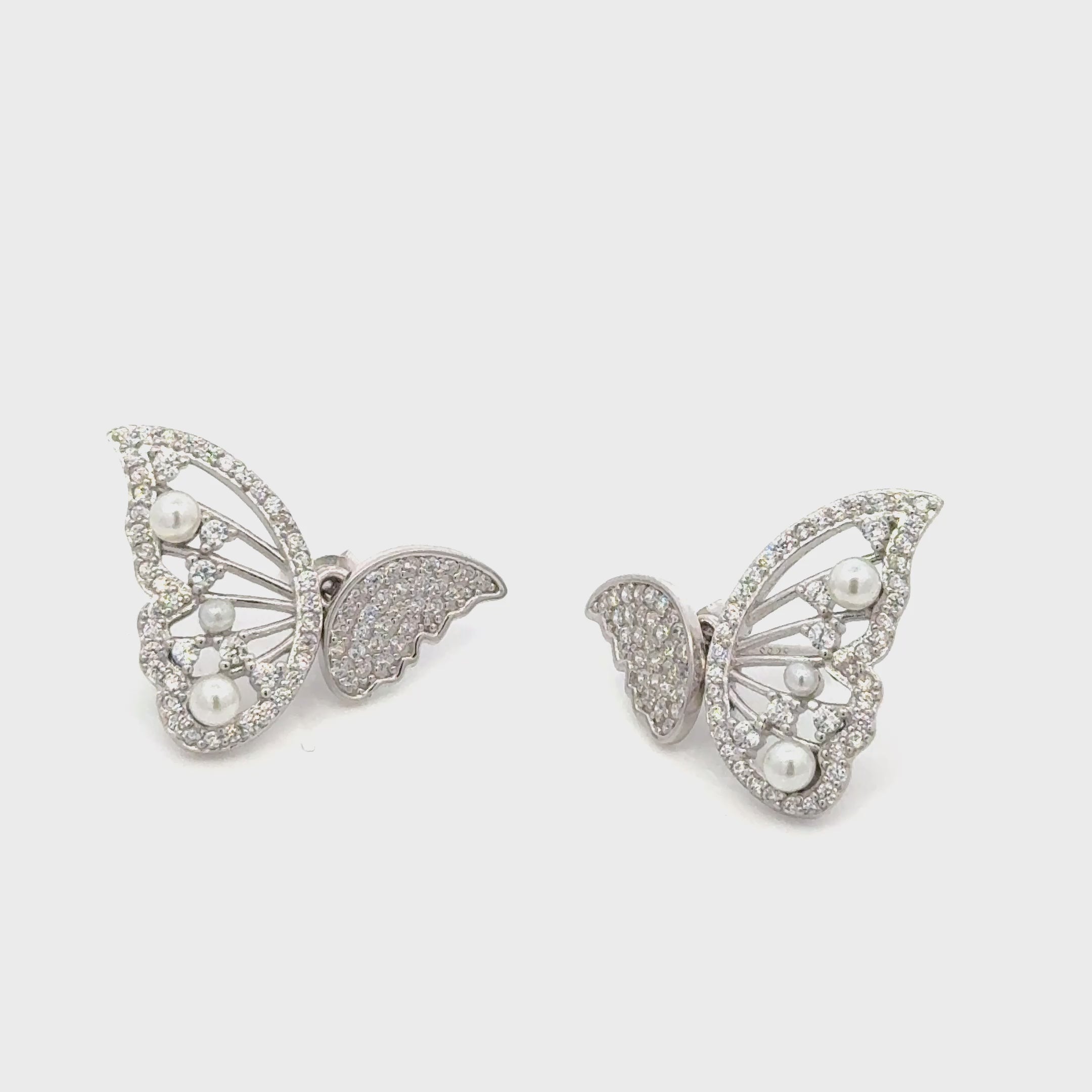 Silver butterfly diamond studded earrings