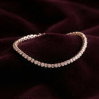 Diamond bracelet on a dark purple fabric background