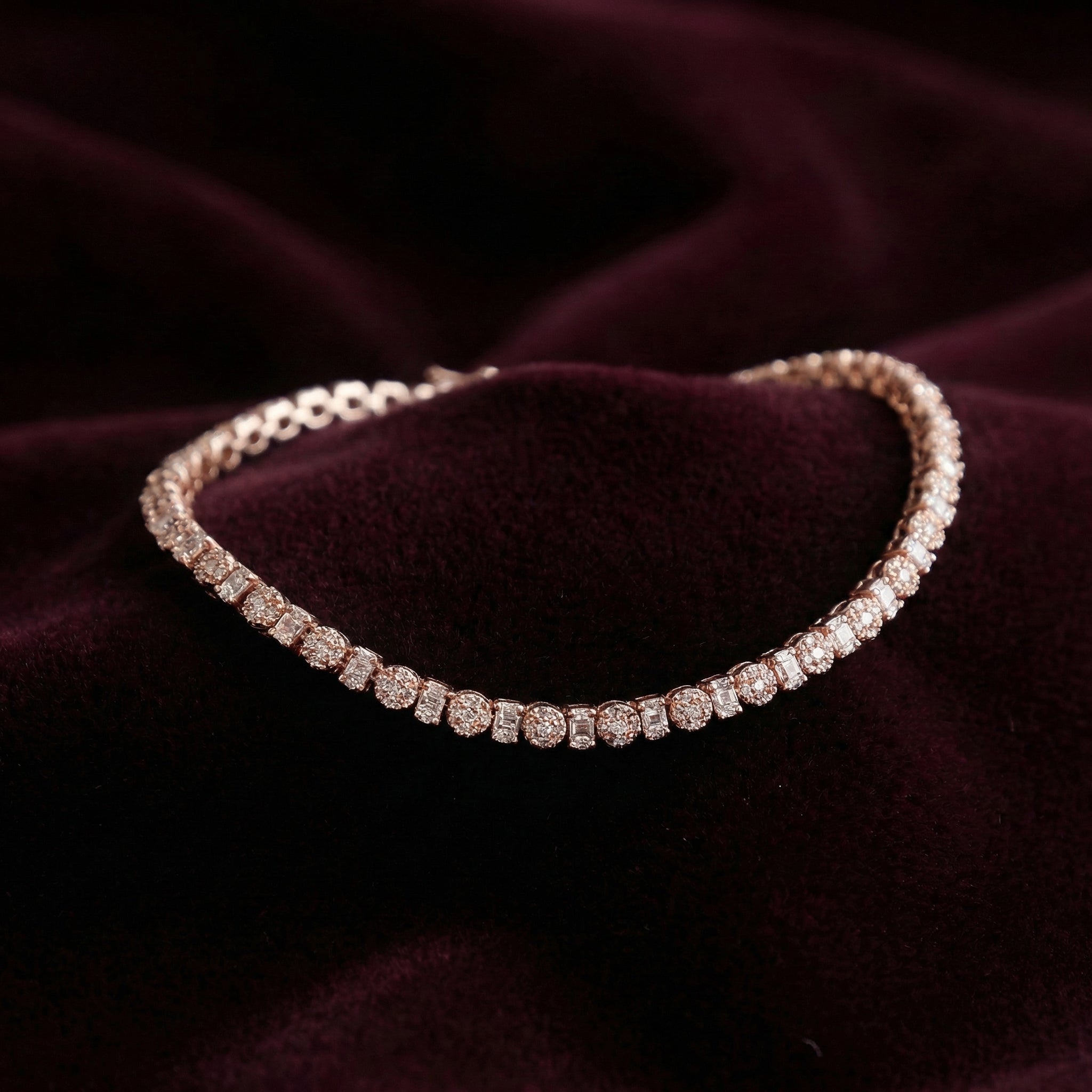 Diamond bracelet on a dark purple fabric background