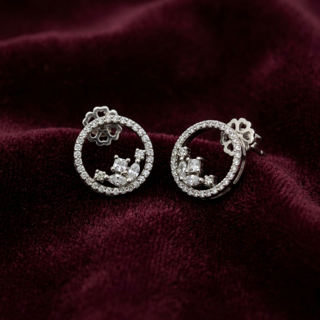 Silver heart shaped designer danglers earrings
