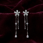 Silver flower designer danglers earrings