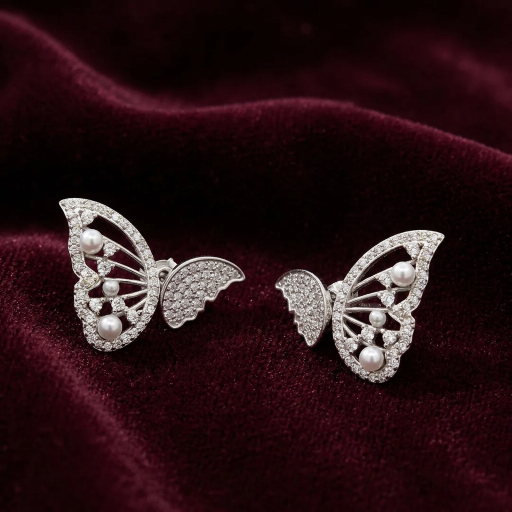 Silver butterfly diamond studded earrings