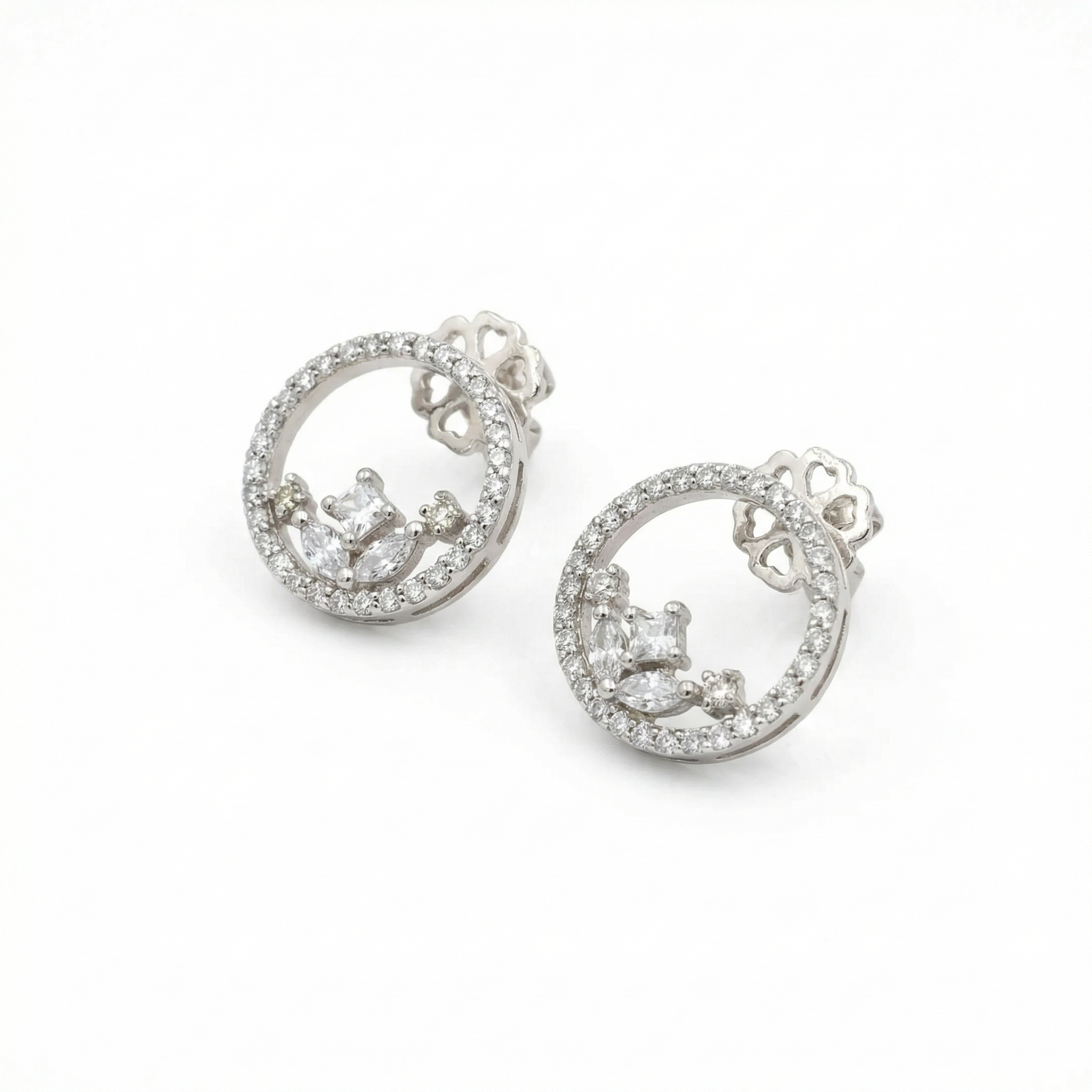 Silver heart shaped designer danglers earrings