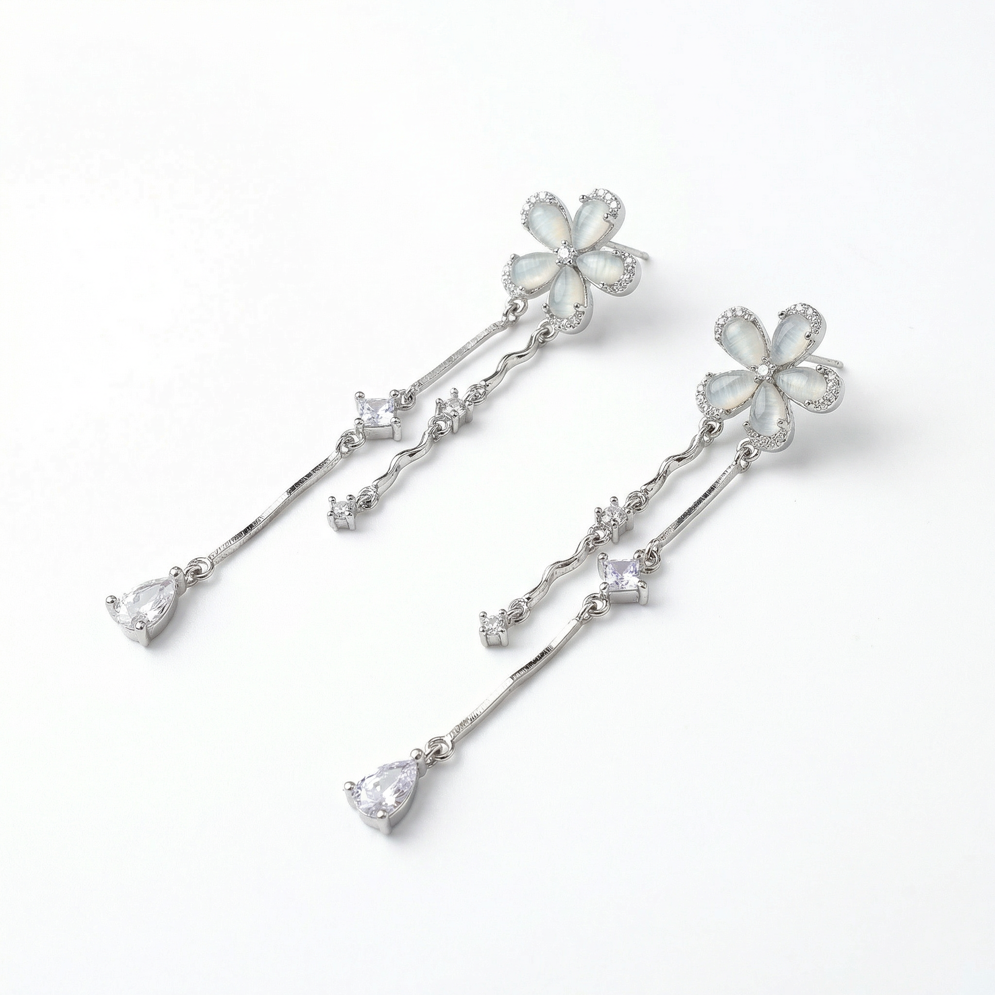 Silver flower designer danglers earrings